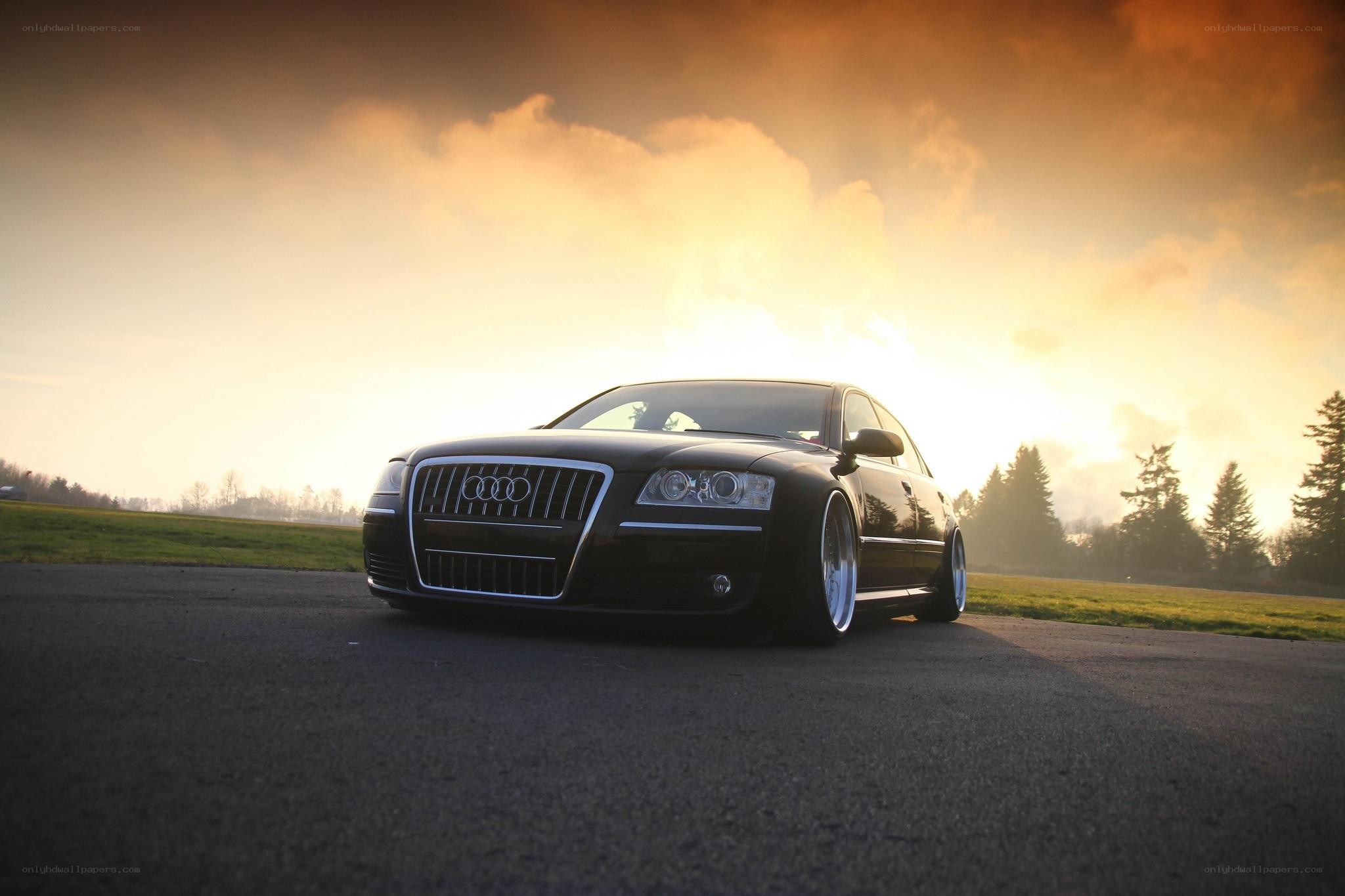 Black Audi at sunset