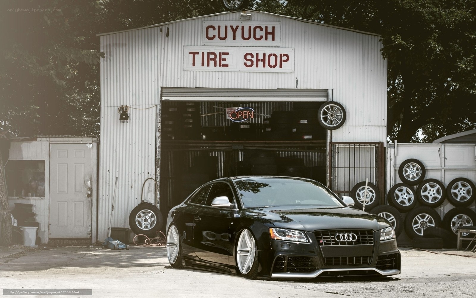Black Audi at tire shop