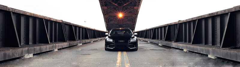 Black Audi Car on Bridge