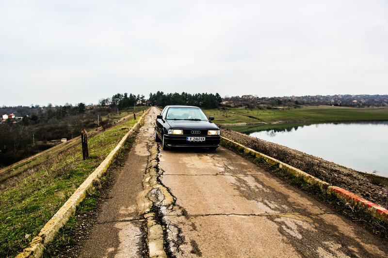 Black Audi Car on Road — Gray