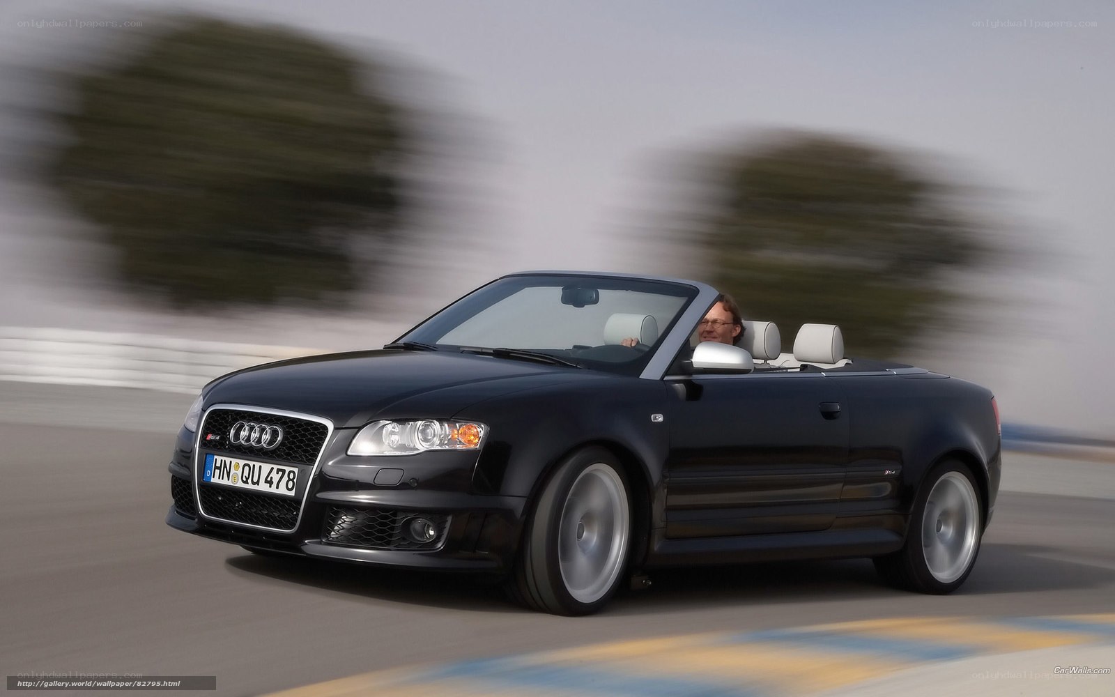 Black Audi convertible in motion