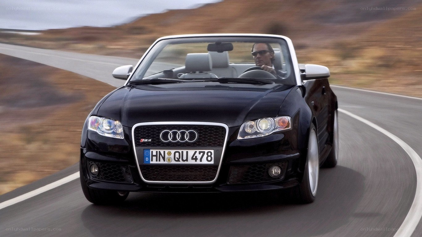 black audi convertible on road