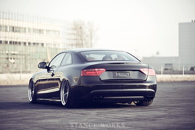 black audi coupe on asphalt