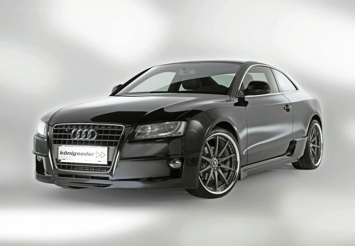 Black Audi coupe with custom wheels