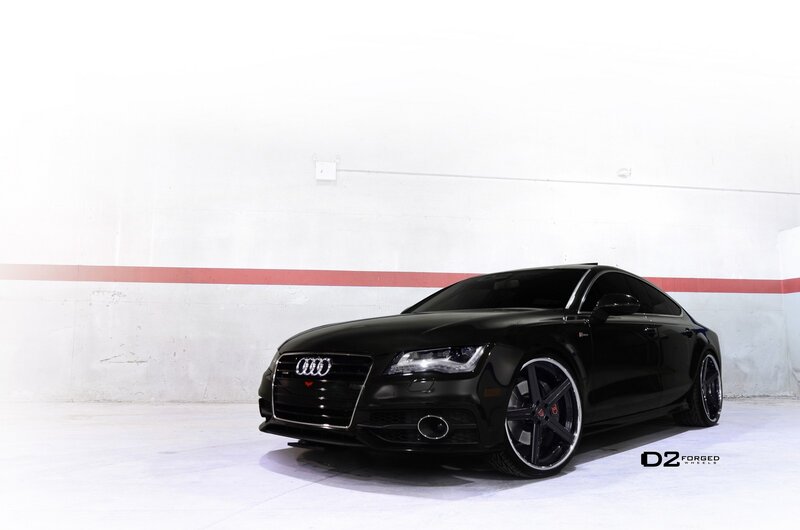 black audi coupe with custom wheels
