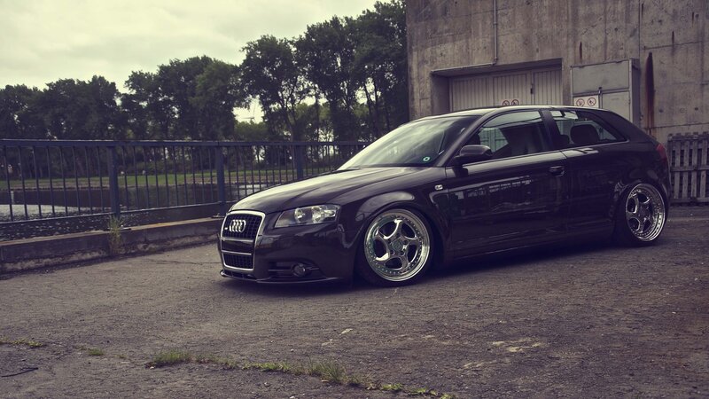 Black Audi Hatchback — Dramatic, Photograph, Car, Building
