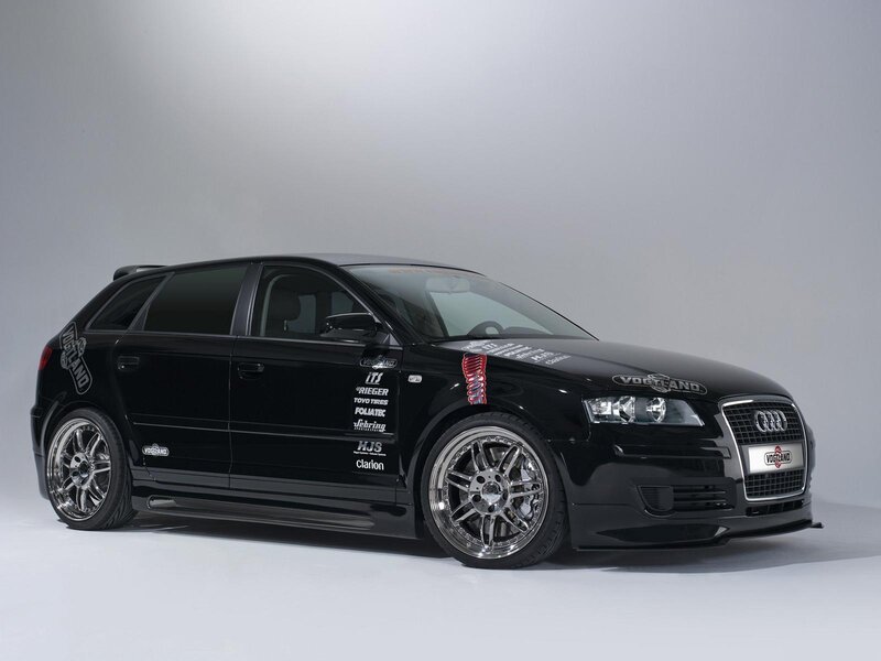 Black Audi hatchback with custom decals