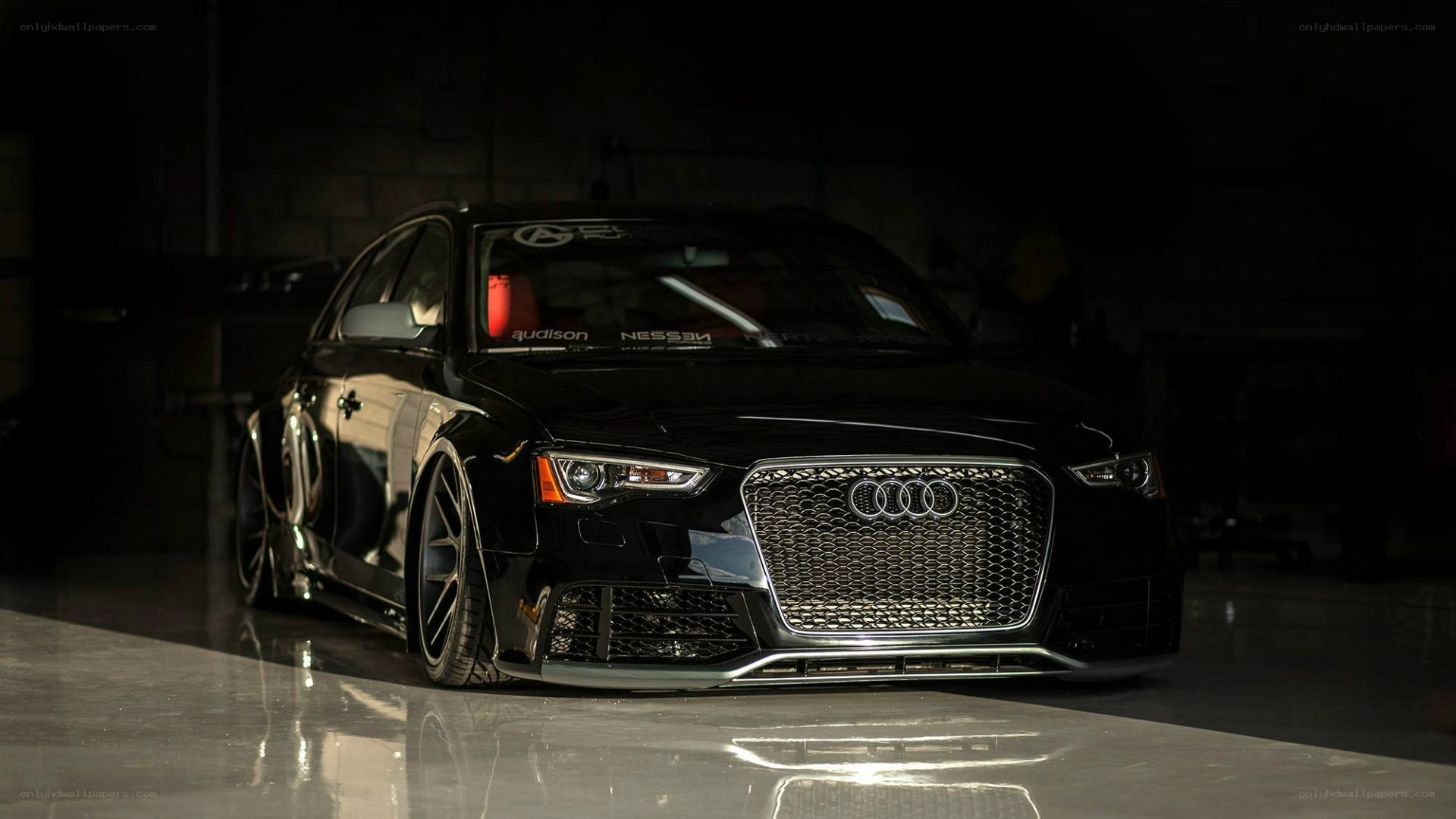 Black Audi in a garage