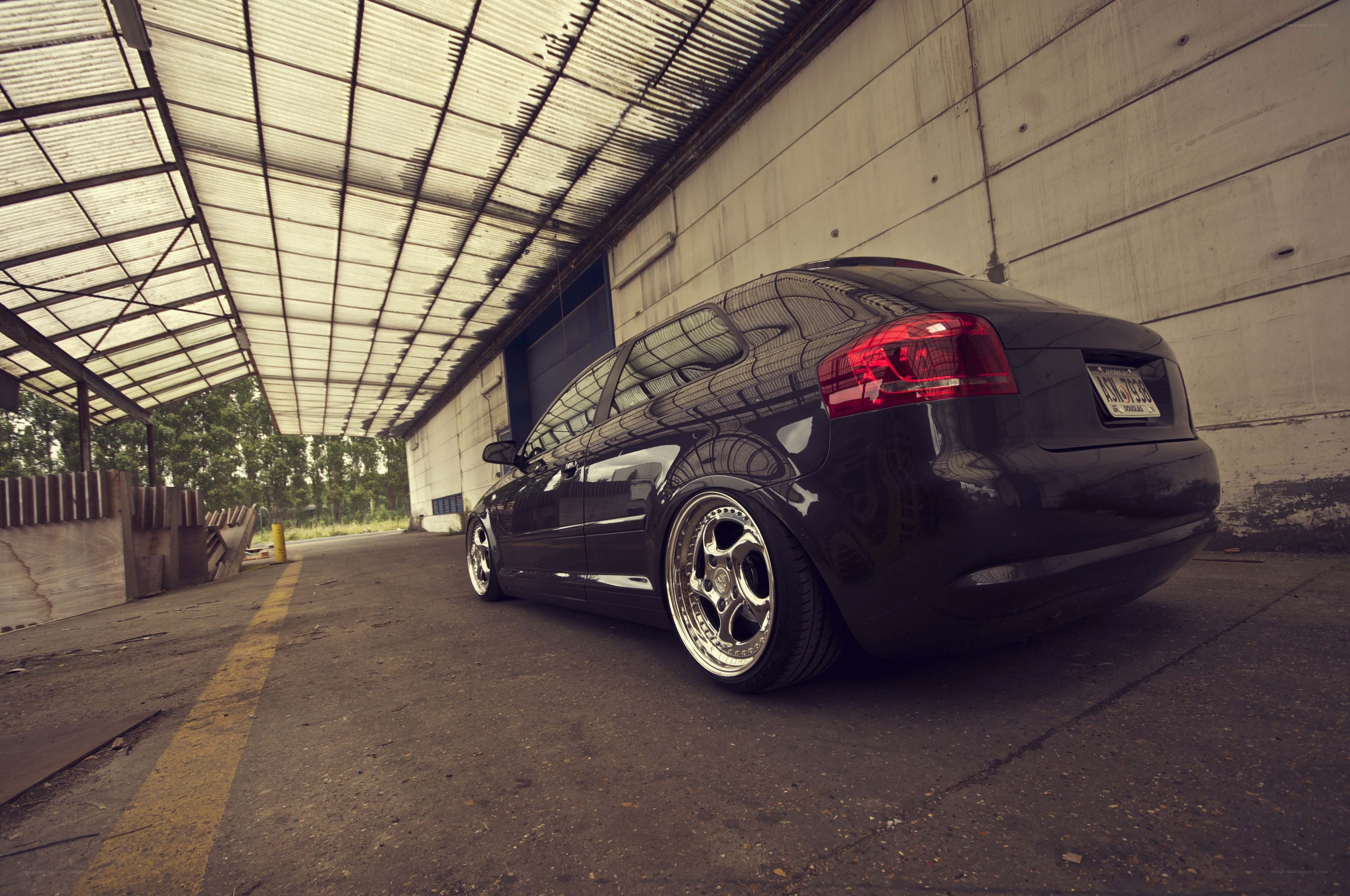 Black Audi in a warehouse
