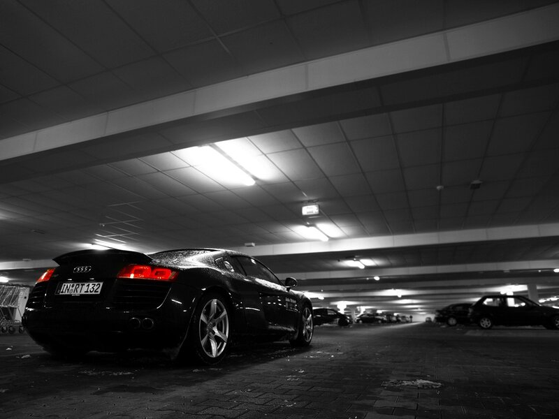 Black Audi in parking garage