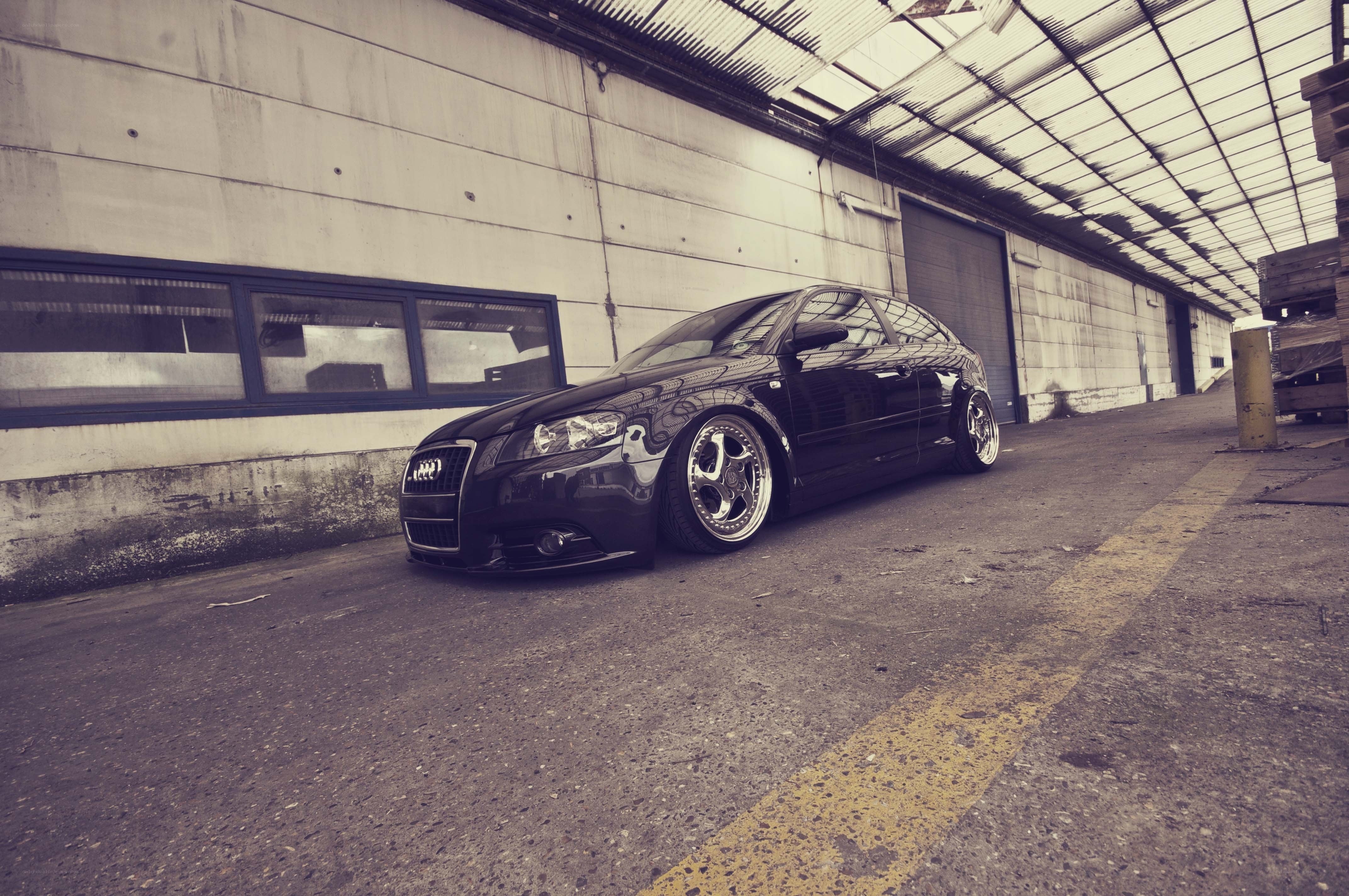 black audi in warehouse