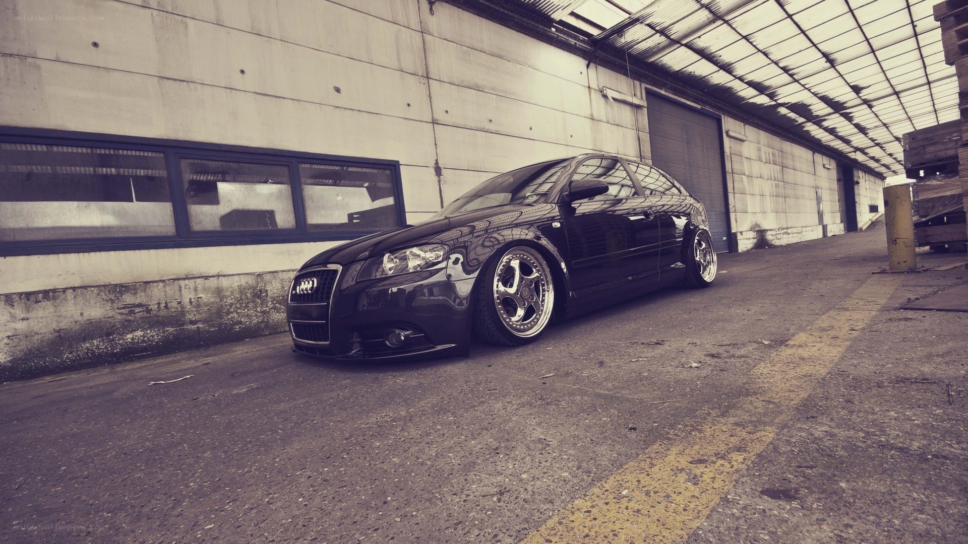 black audi in warehouse