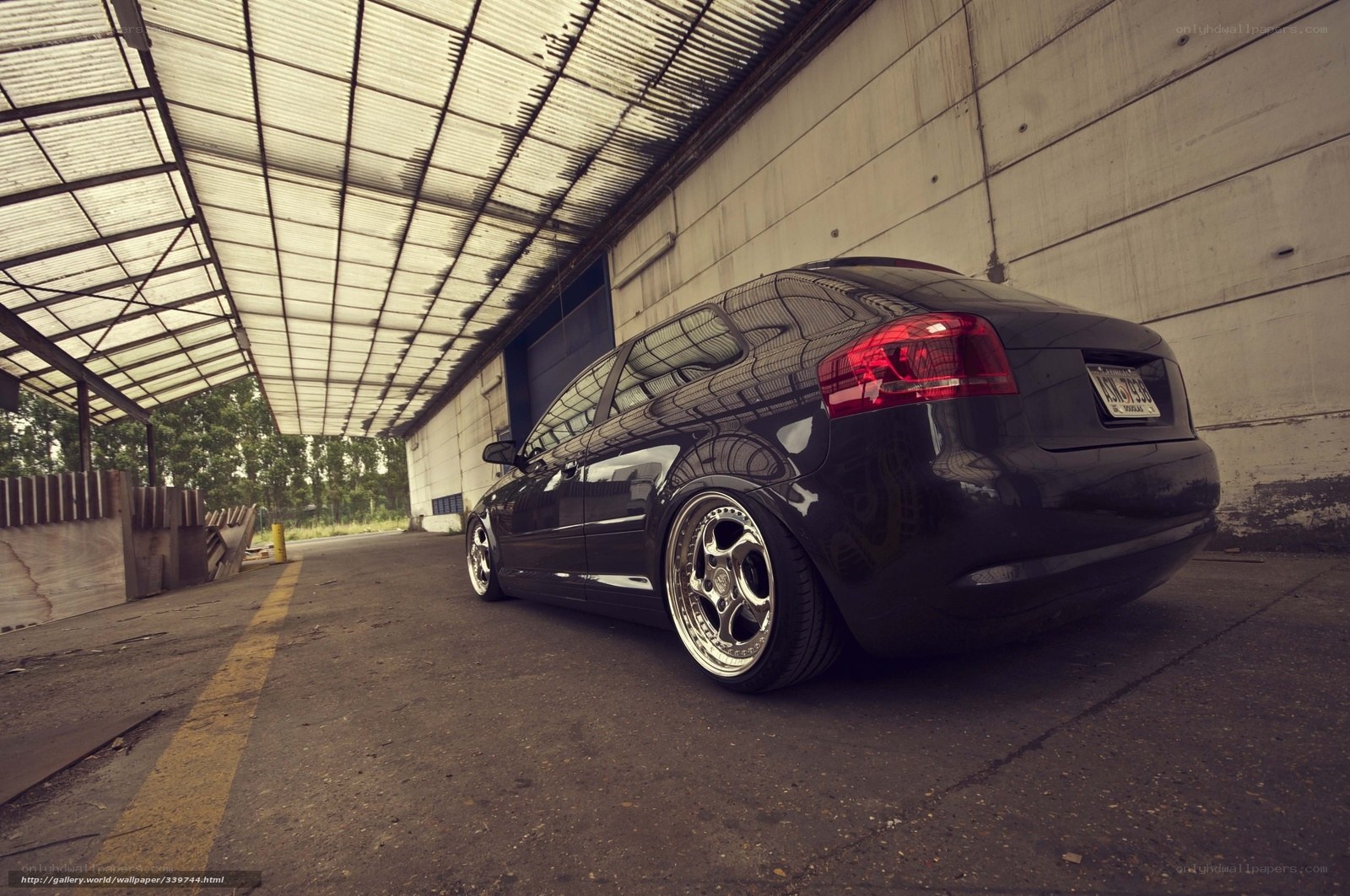 black audi in warehouse