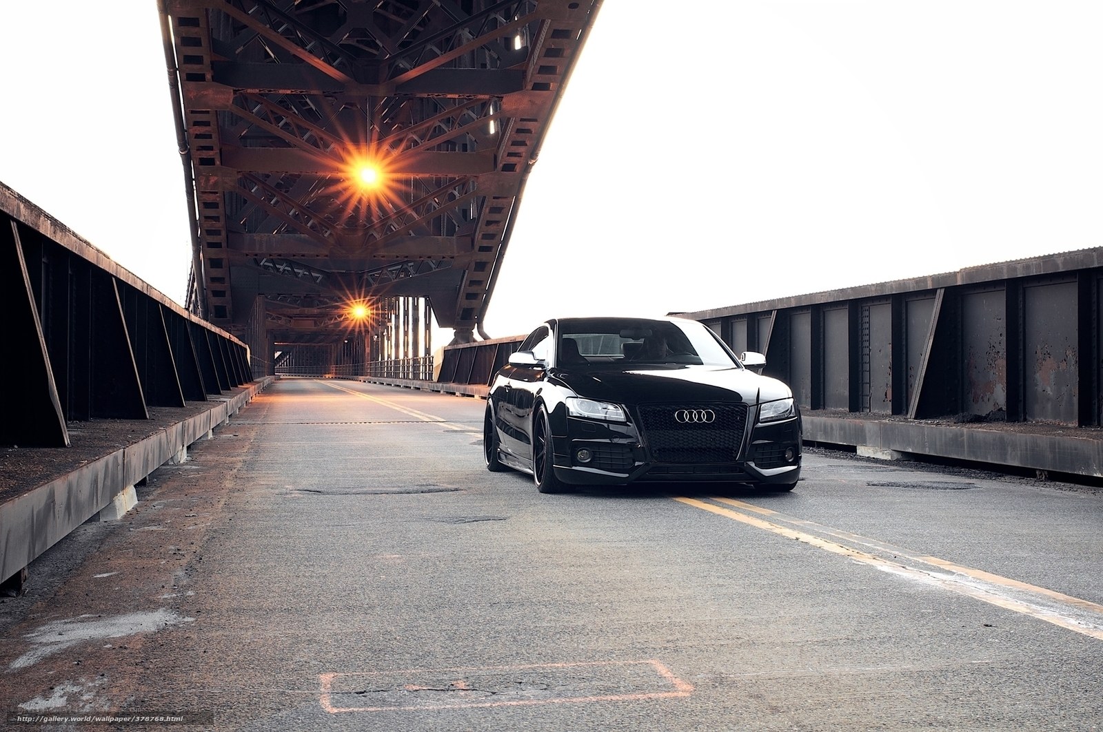 Black Audi on a bridge