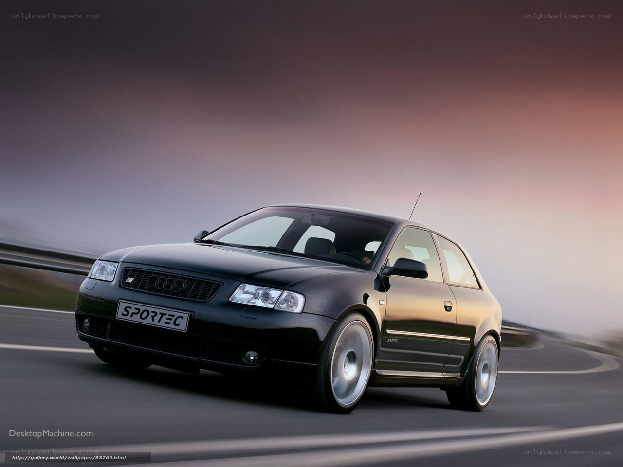 Black Audi on a winding road