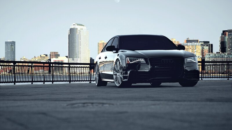 black audi on city bridge