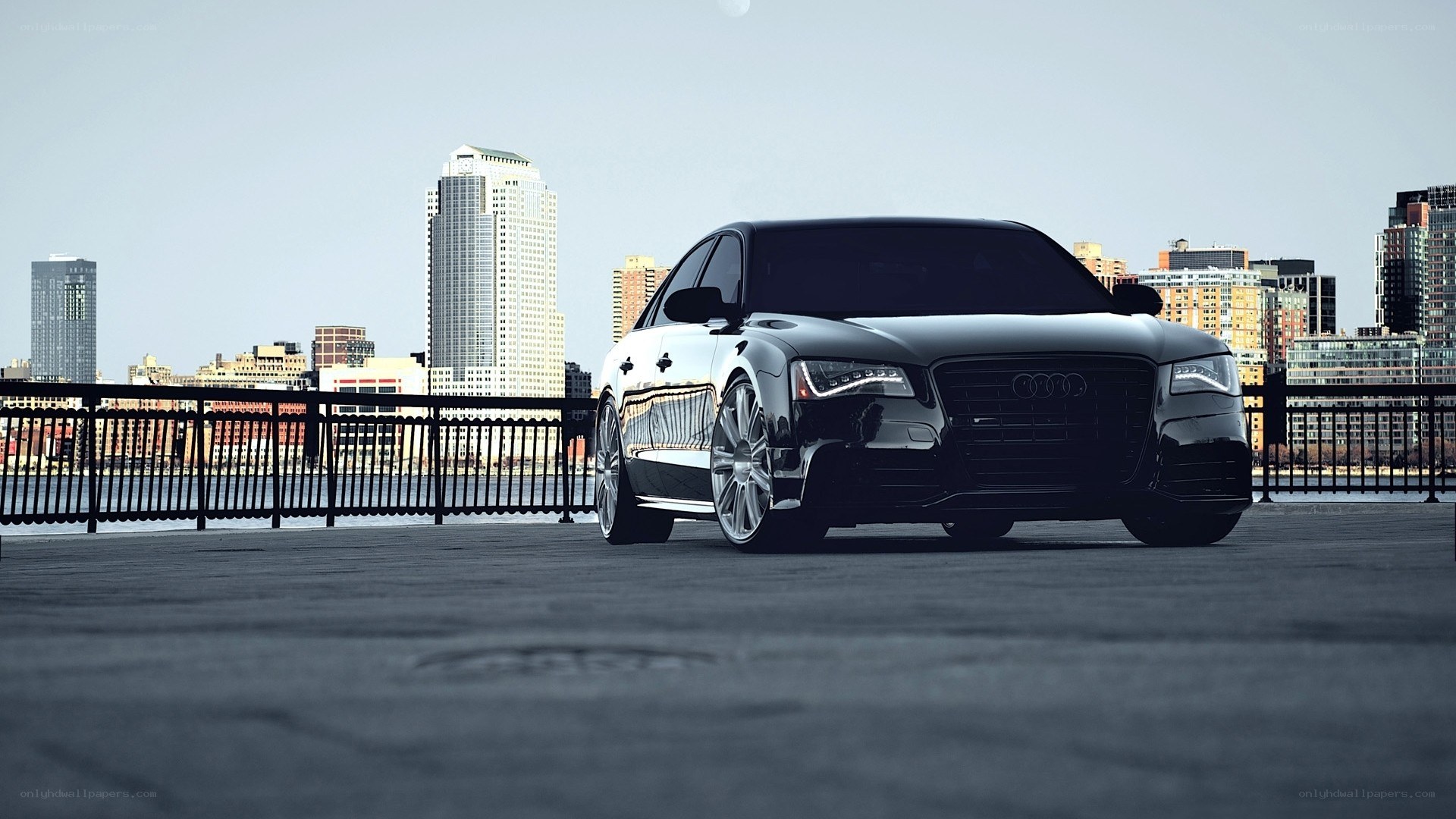 black audi on city bridge