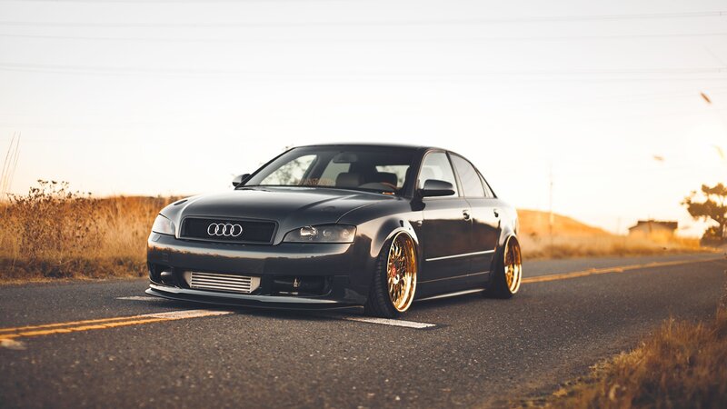 black audi on country road