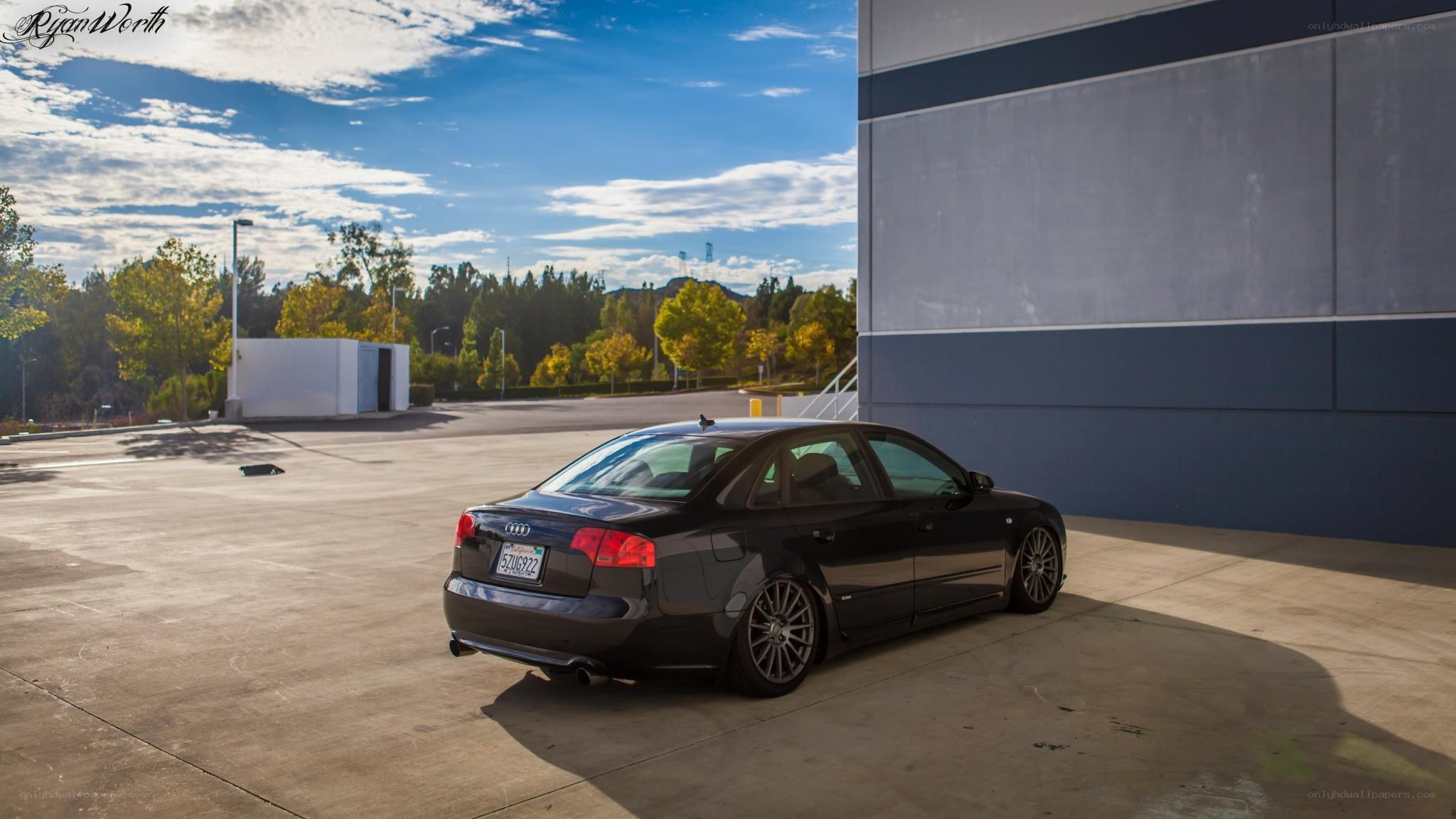 Black Audi parked in lot