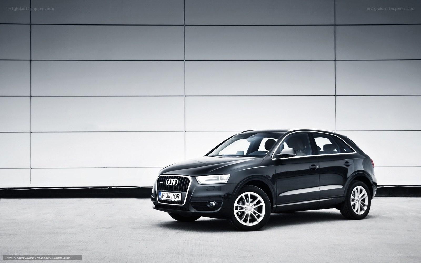 Black Audi Q3 in modern setting