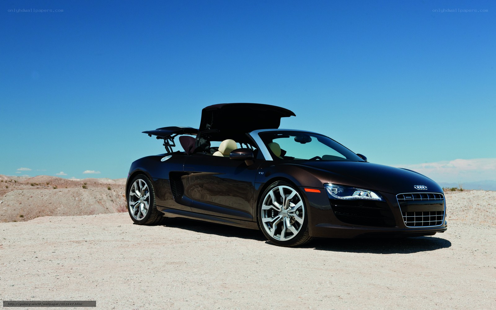 Black Audi R8 convertible in desert