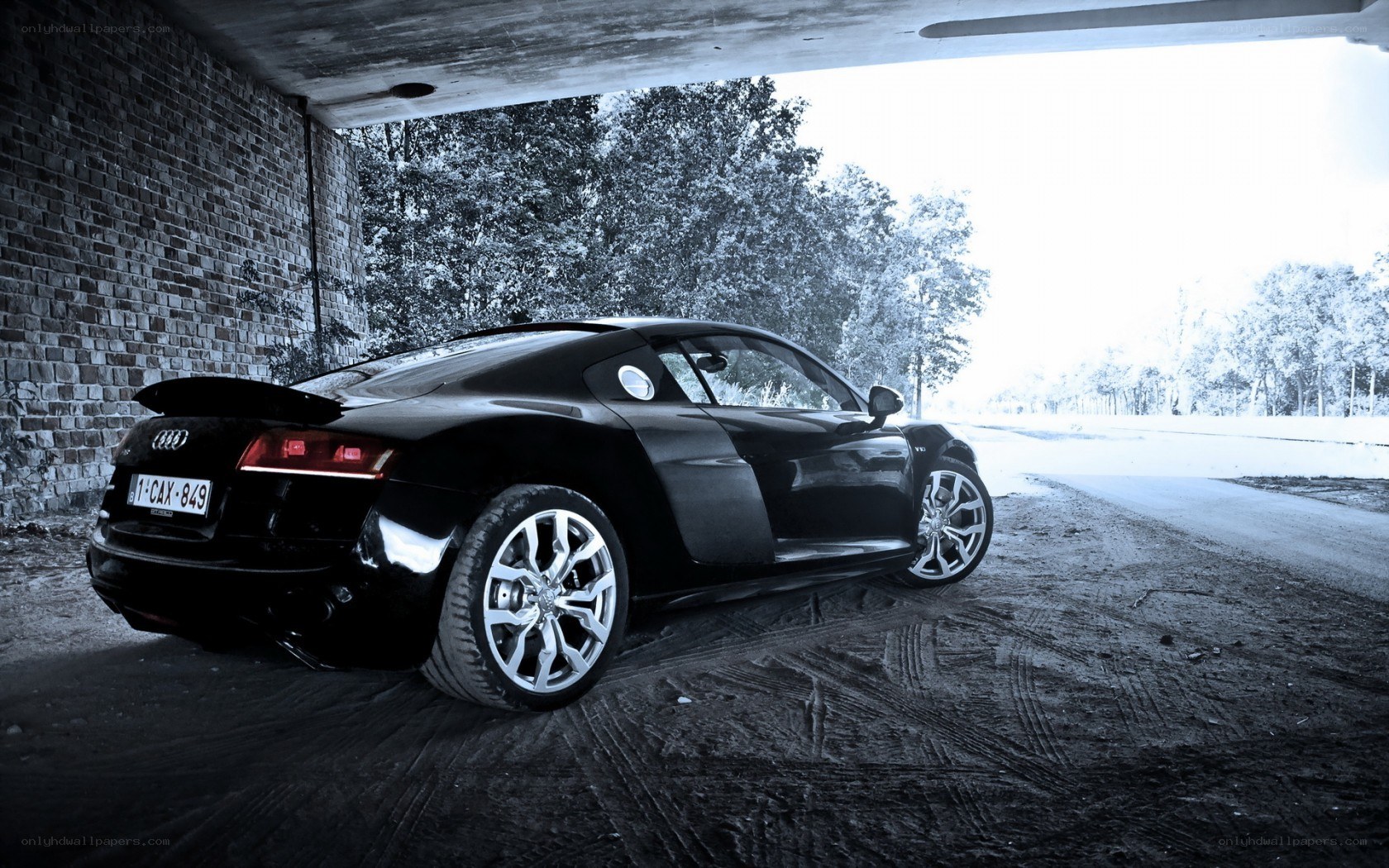 Black Audi R8 in a tunnel