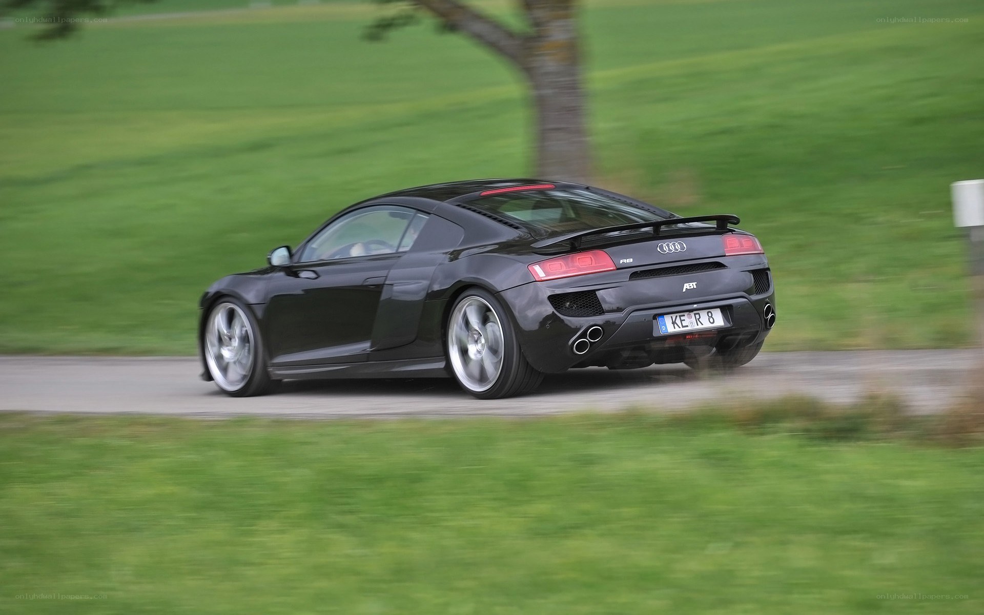 black audi r8 in motion