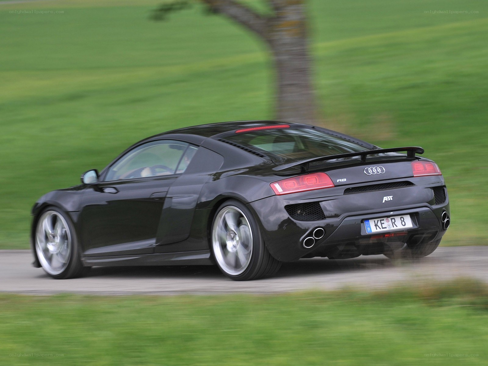 black audi r8 in motion