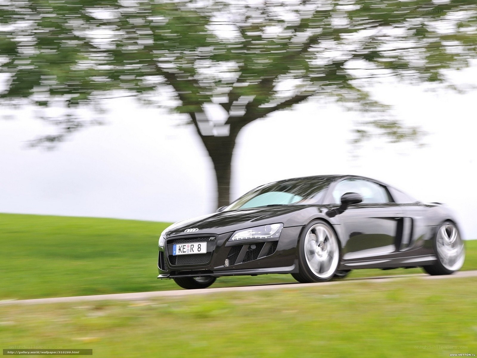 black audi r8 in motion