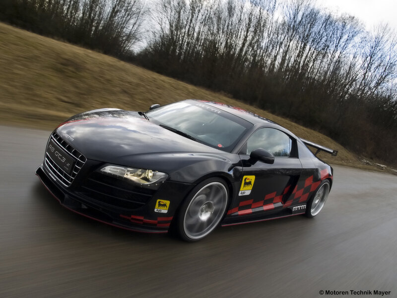 black audi r8 on a racetrack