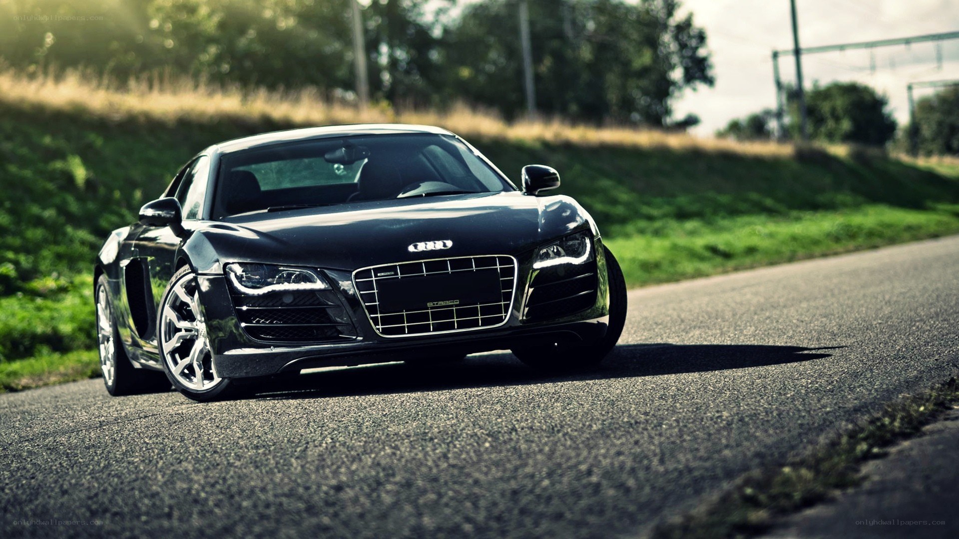 black audi r8 on a road