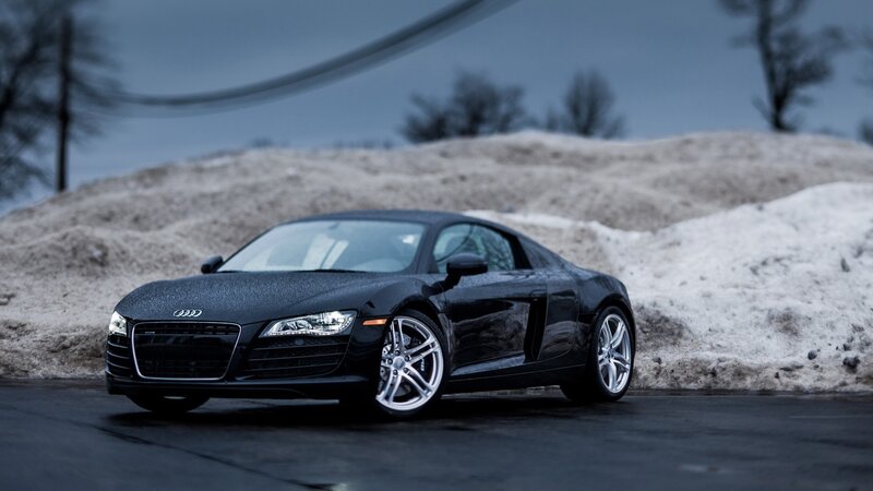 Black Audi R8 on snowy road