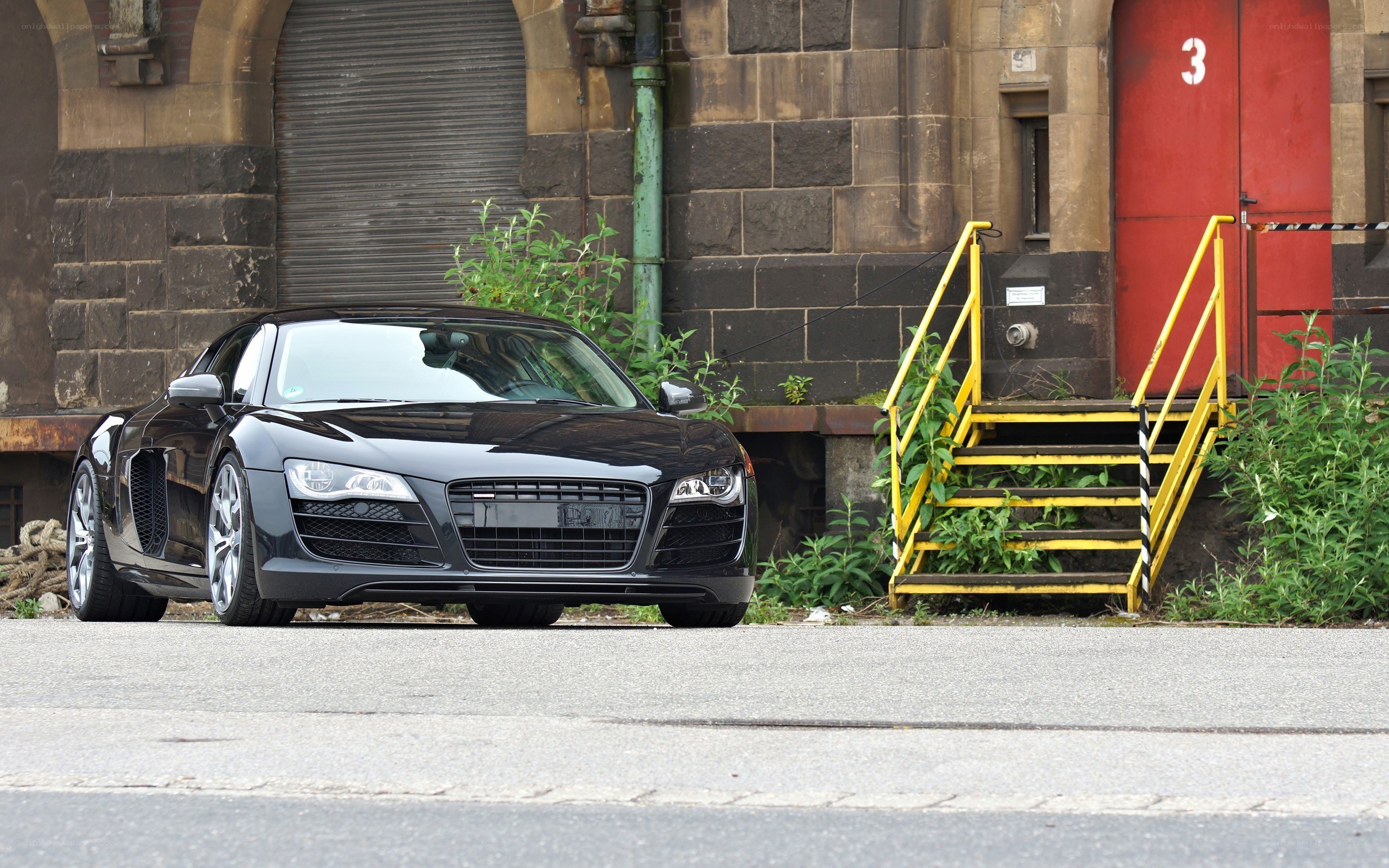 Black Audi R8 parked outside
