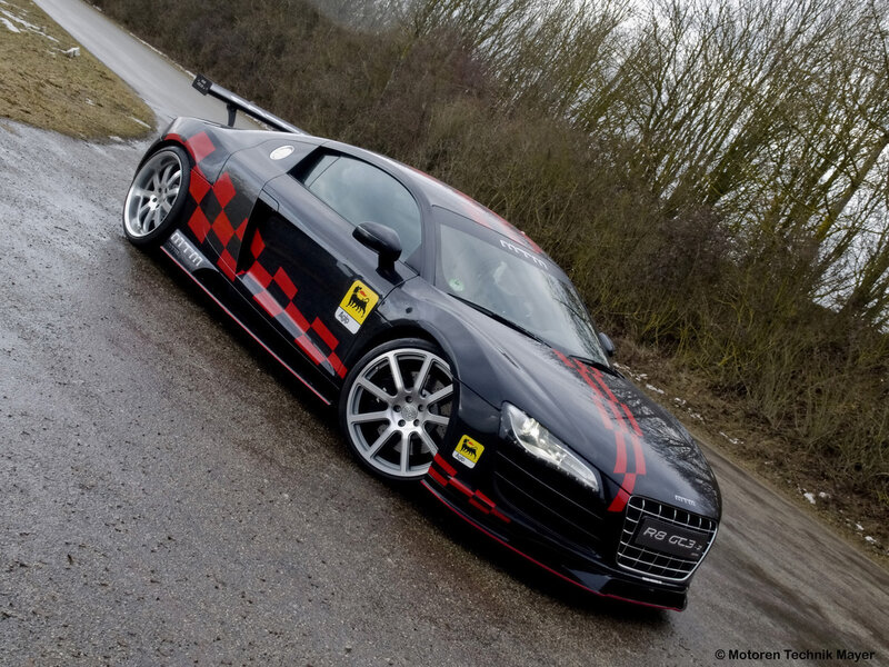 Black Audi R8 race car on road