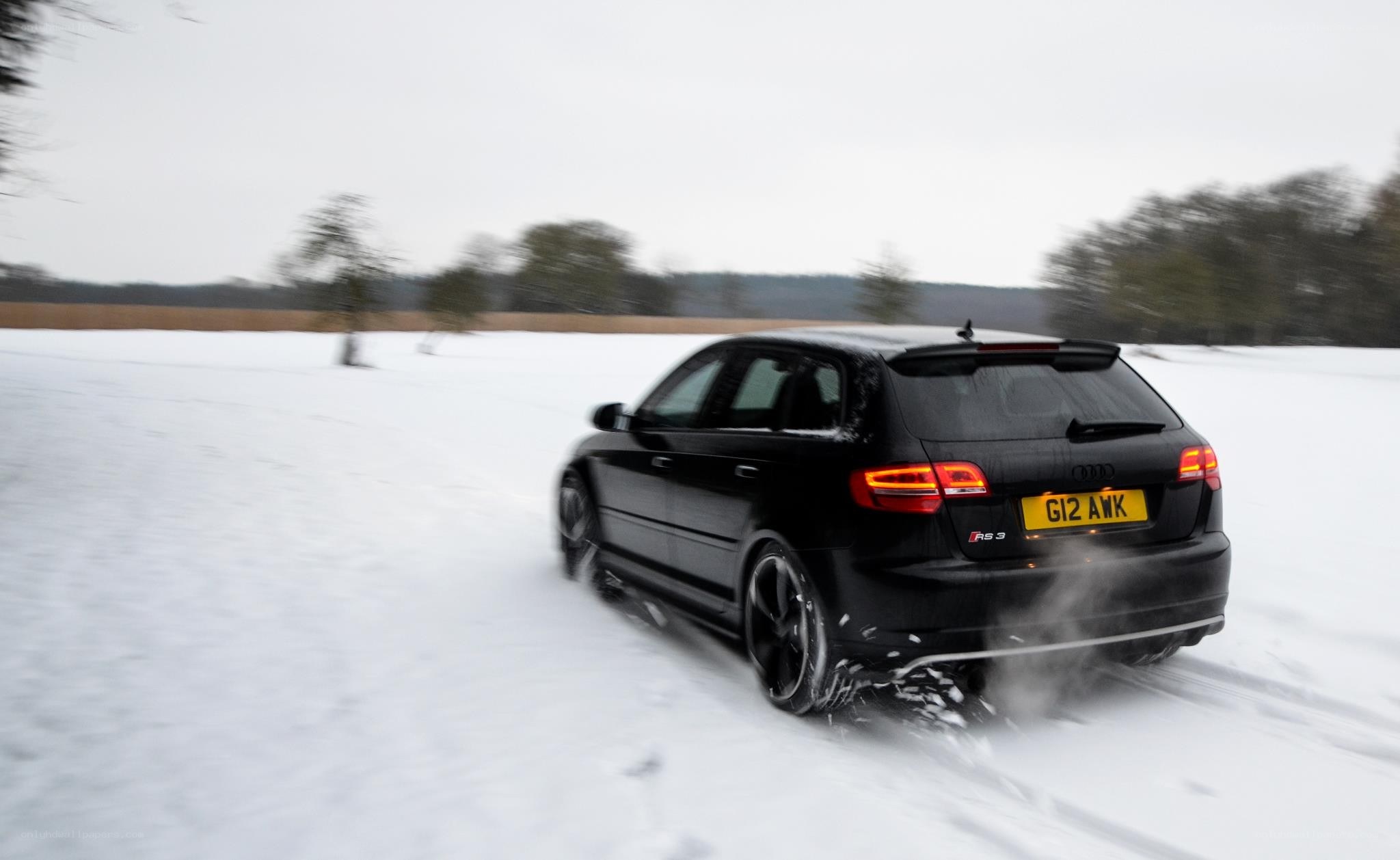 Black Audi RS3 in snow