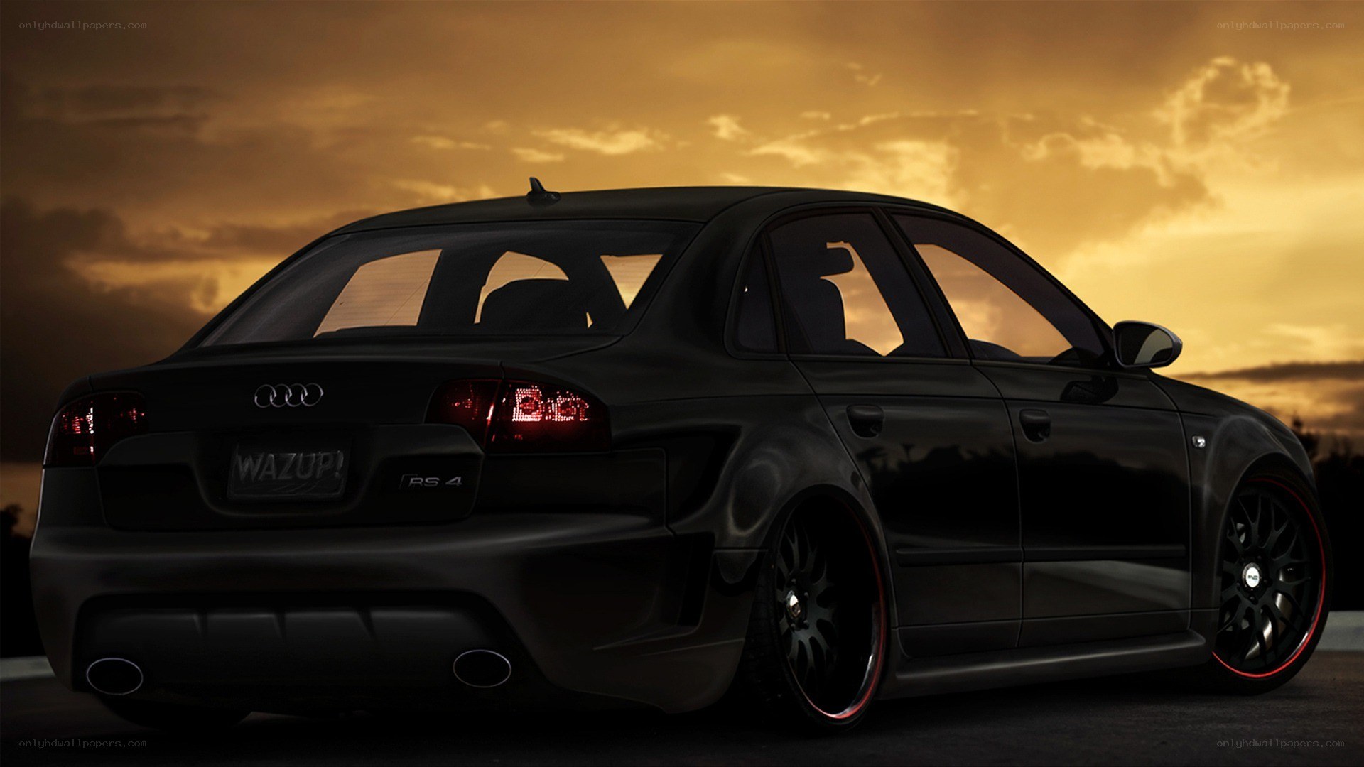 Black Audi RS4 at sunset