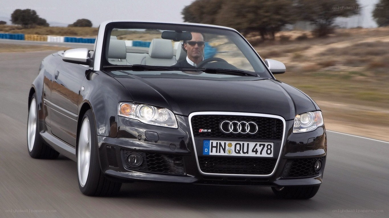 black audi rs4 convertible driving