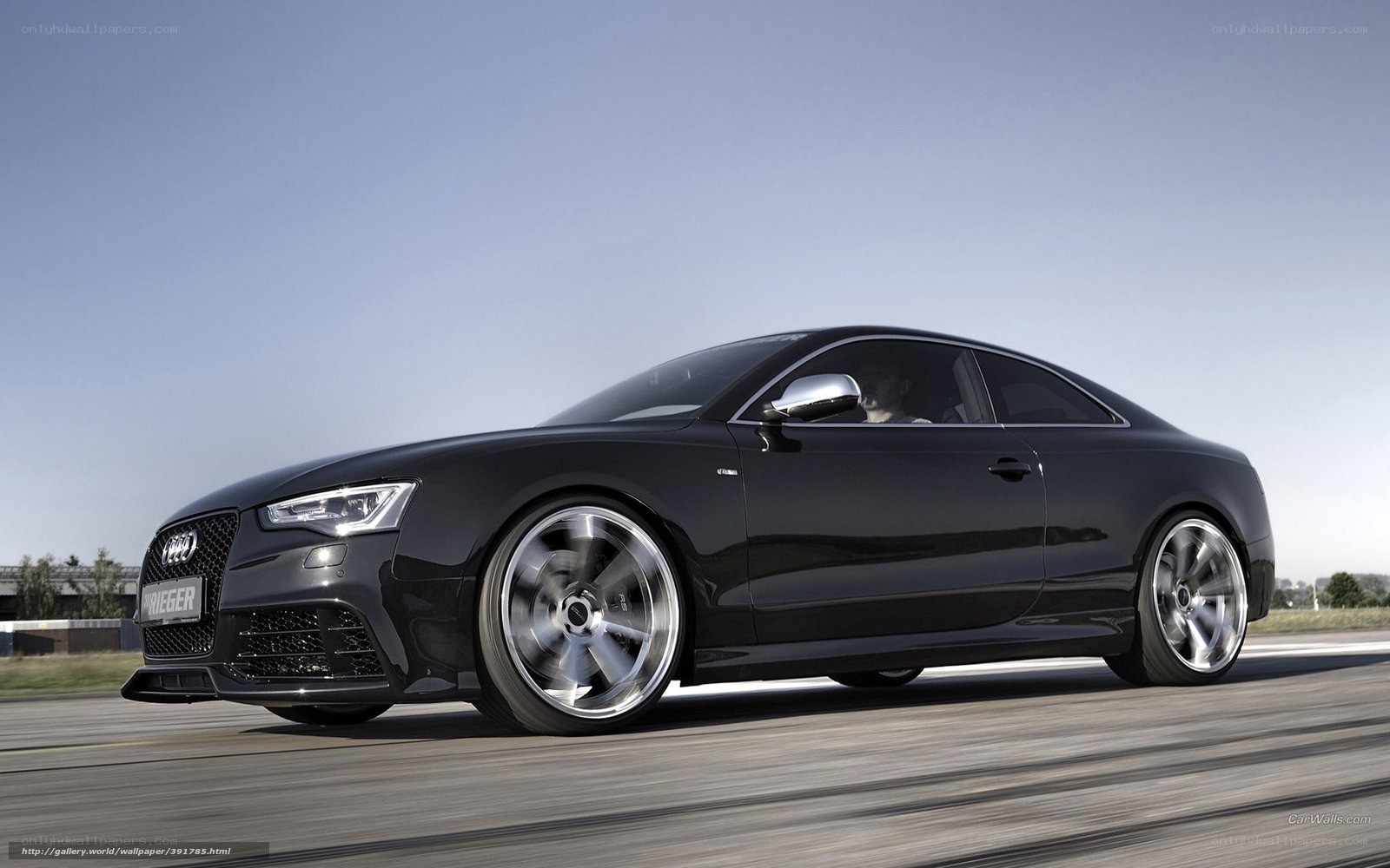 Black Audi RS5 on a racetrack