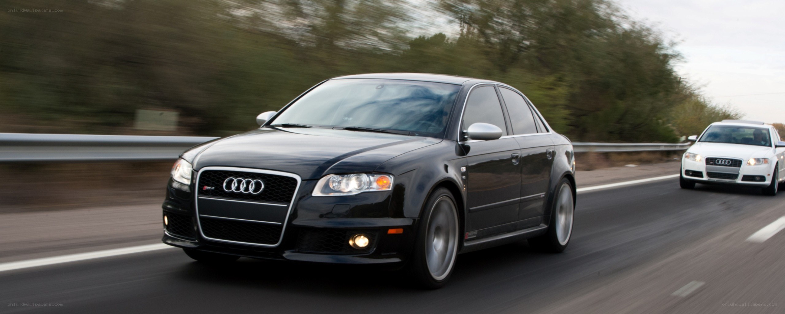 Black Audi S4 on a highway