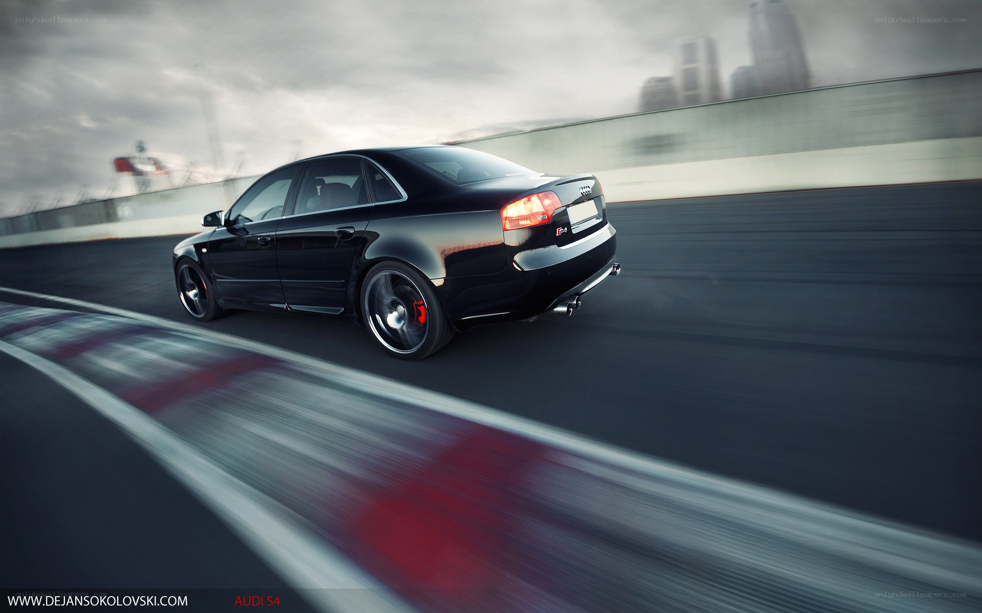 Black Audi S4 on racetrack