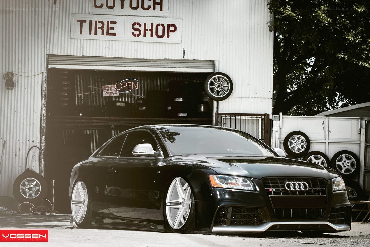 Black Audi S5 at tire shop