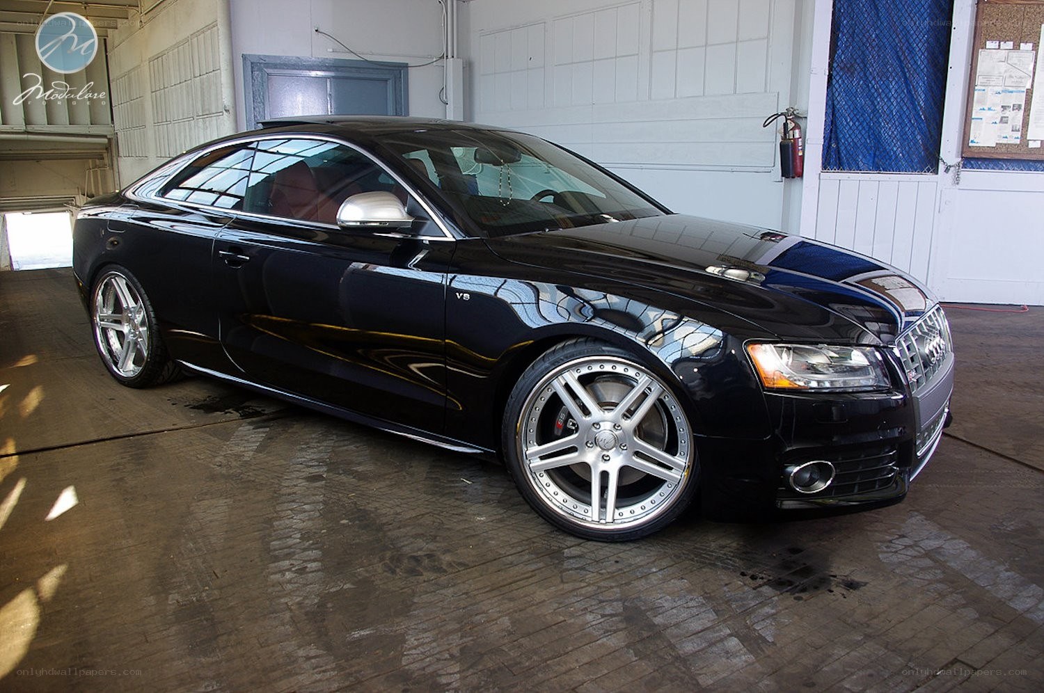 Black Audi S5 in garage