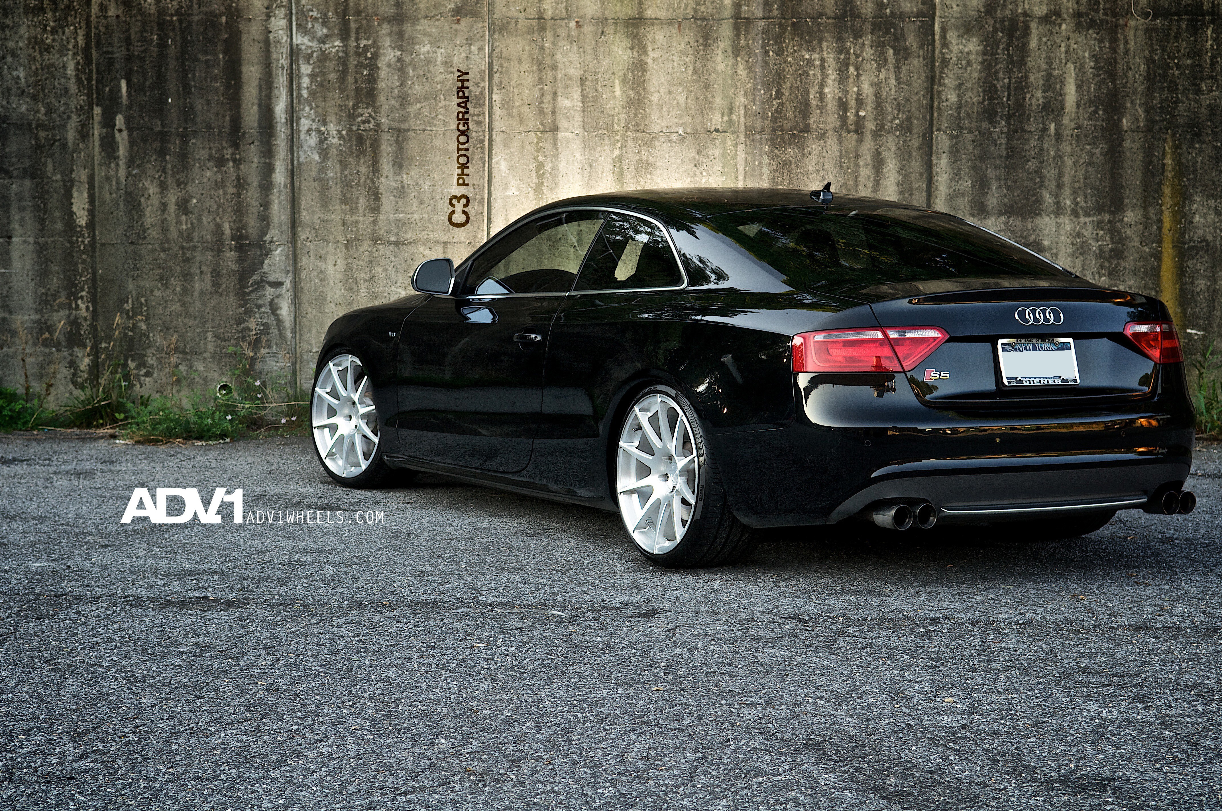 Black Audi S5 with custom wheels