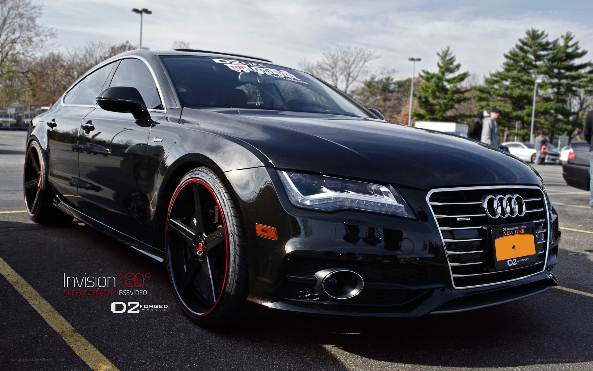 Black Audi S7 with custom wheels