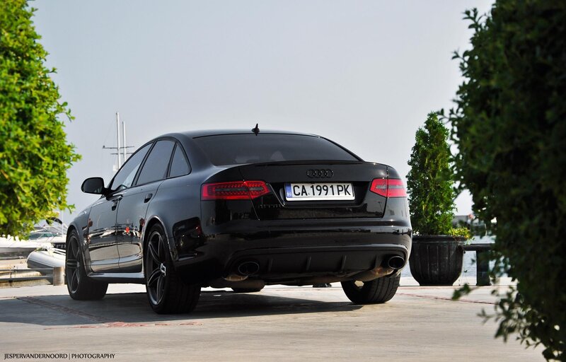 Black Audi sedan at marina