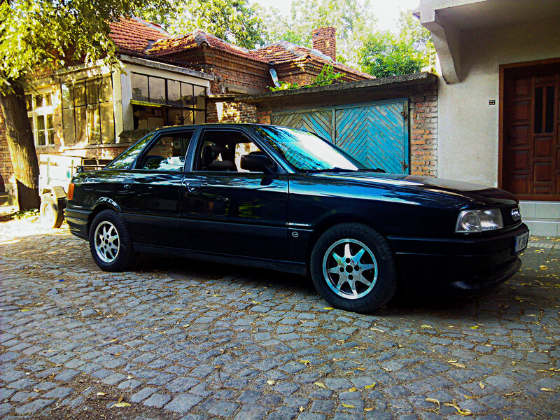 Black Audi Sedan — Calm, Afternoon