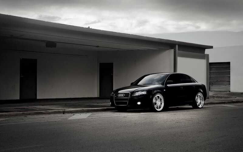 Black Audi Sedan — Dramatic, Photograph, Building