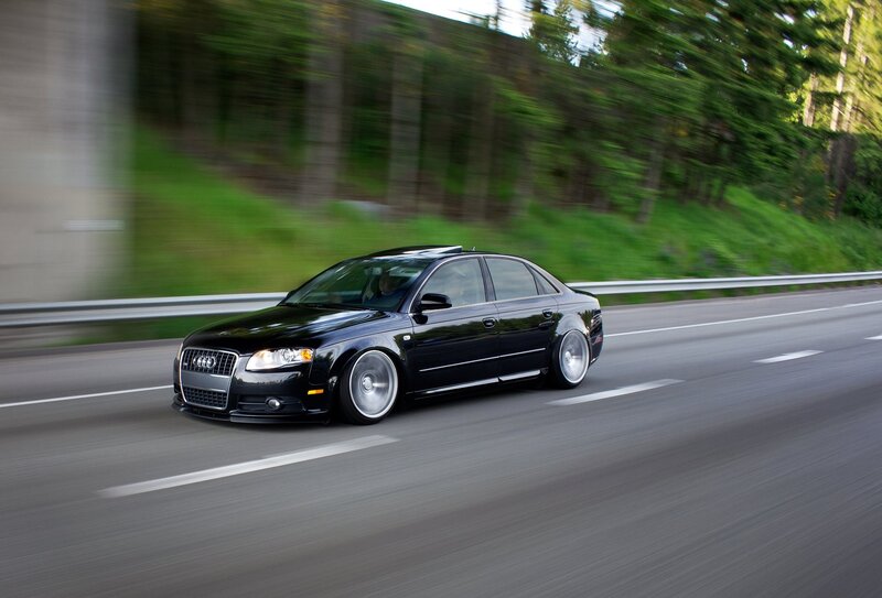 black audi sedan on highway