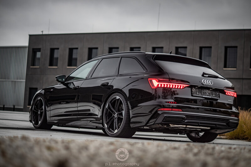 Black Audi Station Wagon — Dramatic, Photograph, Building