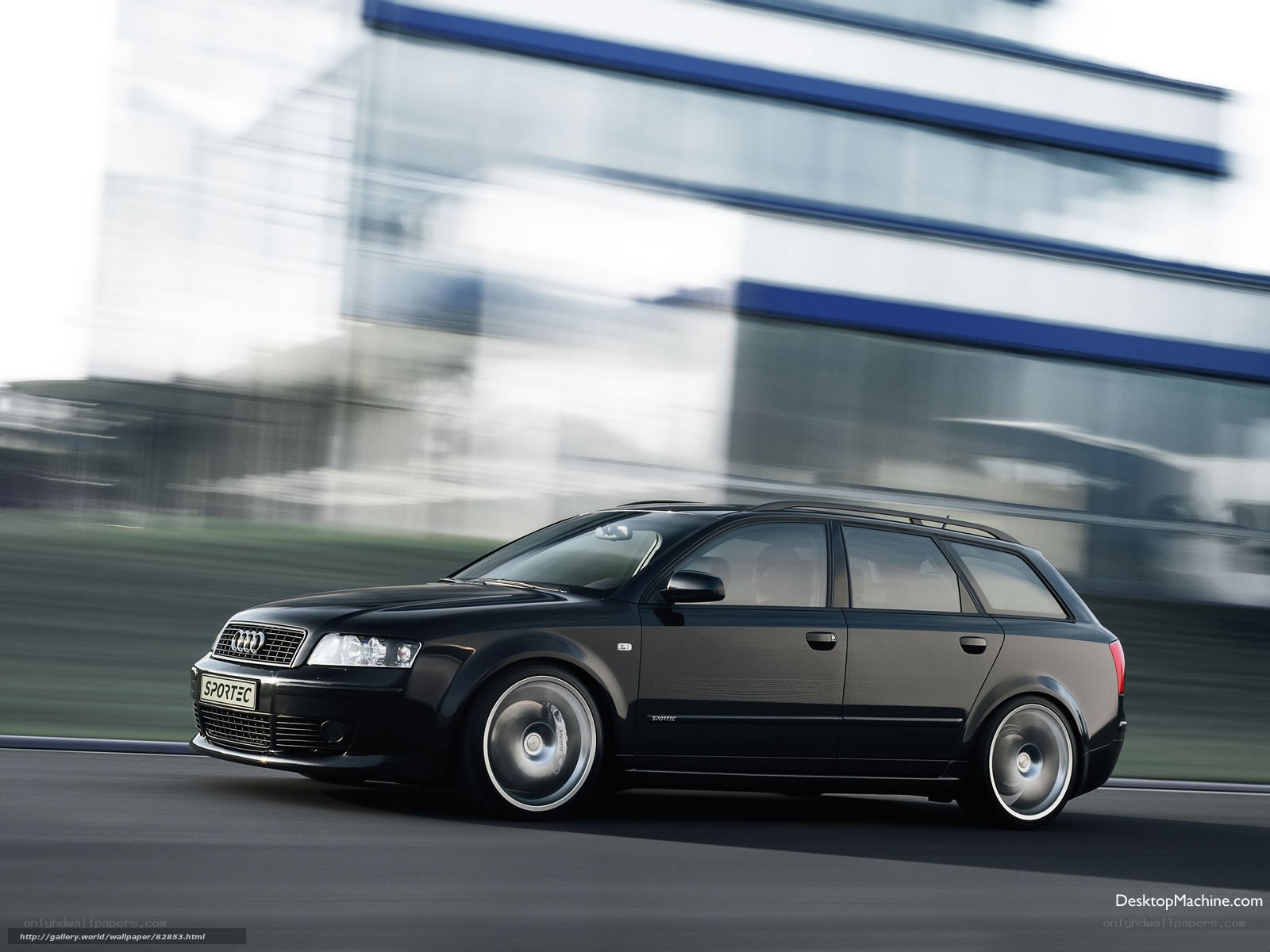 Black Audi station wagon in motion